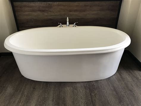 Not an a small freestanding tub can be the perfect addition to urban spaces and bathrooms. Stand alone tub, not a claw foot it big enough for two ...