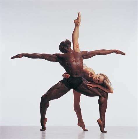 Female Dancer Standing On One Leg By Chris Nash