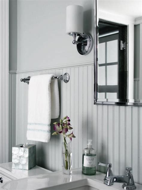 See more ideas about subway tile, tile bathroom, bathrooms remodel. How to Cover Dated Bathroom Tile with Wainscoting | HGTV