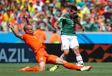 2014 Fifa World Cup Netherlands Defeats Mexico 2 1 Costa Rica Knocks Out Greece In Penalty Kicks