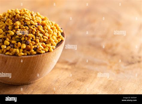 A Bowl Of Pellets Of Yellow Bee Pollen Stock Photo Alamy