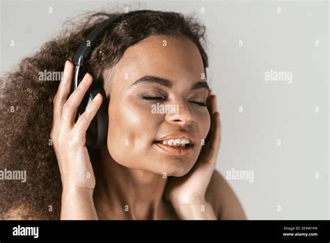 African American Female Listening To Music Hi Res Stock Photography And