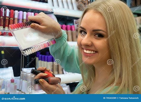 Blonde Selecting Nail Polish Stock Photos Free And Royalty Free Stock