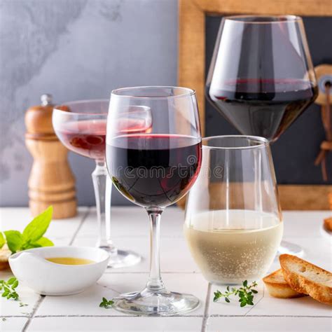 Variety Of Wine Glasses With Red White And Rose Wine Stock Image