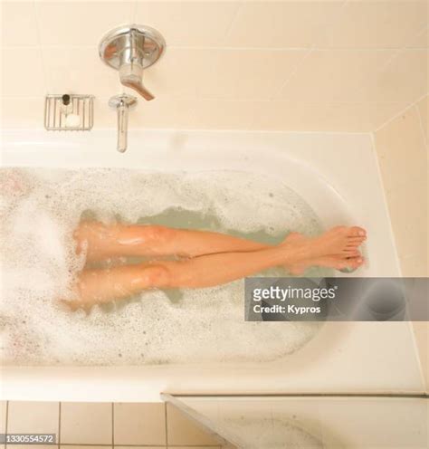 woman in bubble bath feet photos and premium high res pictures getty images