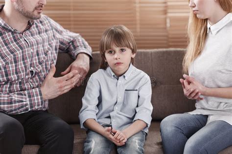 Sad Child While Parents Arguing Stock Image Image Of Couple Autism