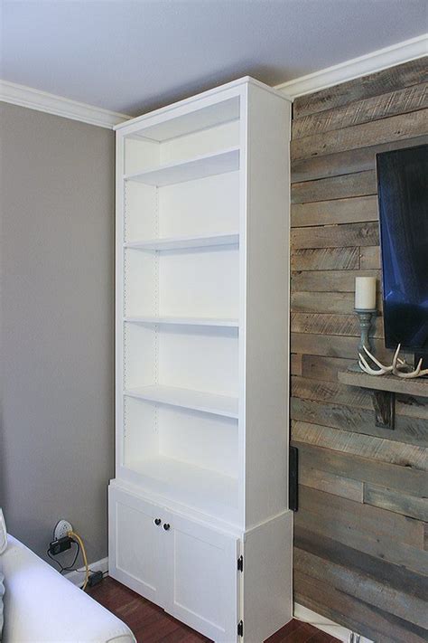 How To Make Prefab Bookcases Look Like Built Ins In 2020 Living Room