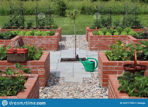 A Modern Vegetable Garden With Raised Briks Beds Stock Photo Image