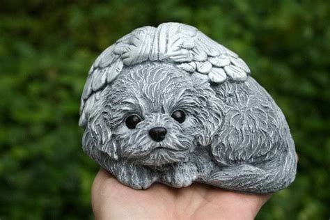 This Angel Dog Statue Is Versatile Enough That It Can Represent Many