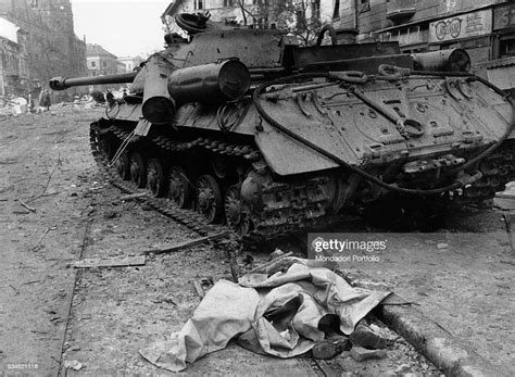 A Corpse Next To A Soviet Tank Damaged During The Revolt Of The