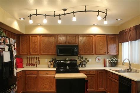 The choice and placement of the lighting largely depends on the placement and size of the table. 34 Awesome Kitchen Lighting Ideas - The WoW Style