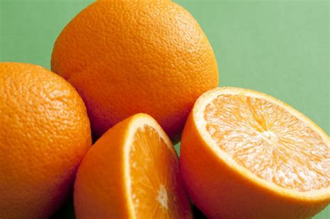 Whole And Halved Oranges Free Stock Image