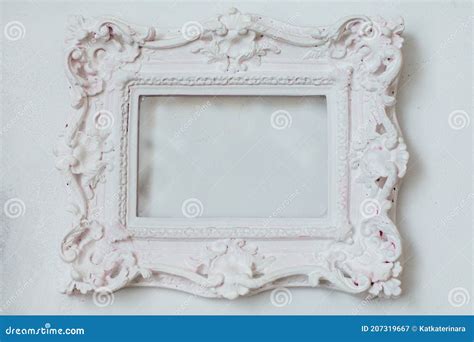 White Stylish Baroque Frame With Copy Space Isolated On White Wall