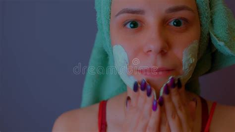 Young Woman With Towel On Head Applies Mask On Face After Shower Procedures Lady Courting Of