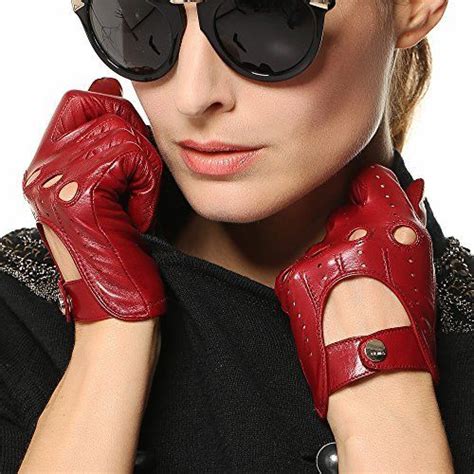 A Woman Wearing Black Sunglasses And Red Gloves