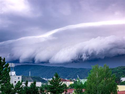 A Massive Shelf Cloud Arcus Cloud Is Slowly Rolling Over The Hill