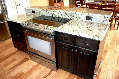 It is a full tutorial that outlines the step by step instructions for using a stove. Eat in island with built in range and outlets | Kitchen ...