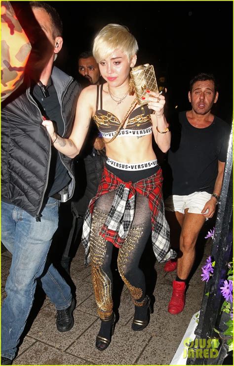 Miley Cyrus Enters A Club Fully Clothed Leaves In Her Bra Photo 3109049 Miley Cyrus Photos