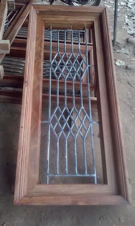 Kerala Style Carpenter Works And Designs Wooden Windows With Stainless