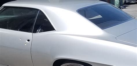 PPG clear coat changed color/reflectance of silver met. paint