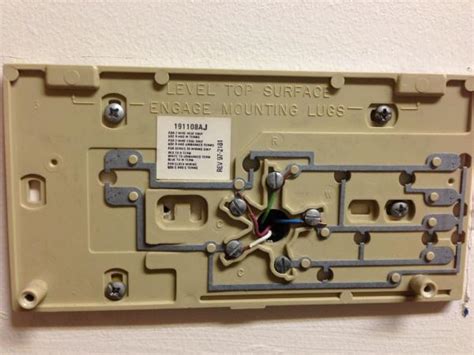 Having a second person feeding wire from the spool or coil into the wall will help prevent snags. Replacing Old Honeywell Chronotherm to Honeywell Wi-Fi Thermostat Wiring Help - DoItYourself.com ...