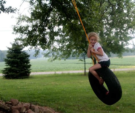 Pin By Sandy English On Just A Swingin Tire Swing Childhood