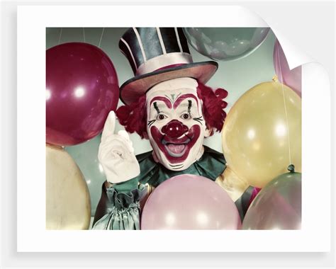 1950s Circus Clown Portrait Smiling Amid Balloons Pointing Up Looking