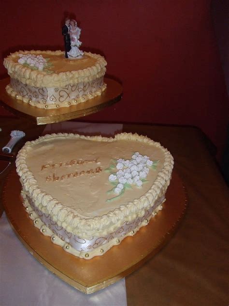 Bake for 45 to 50 minutes in the preheated oven, until cake tests done with a toothpick. This 2 tier heart carrot cake was done for an Indian ...