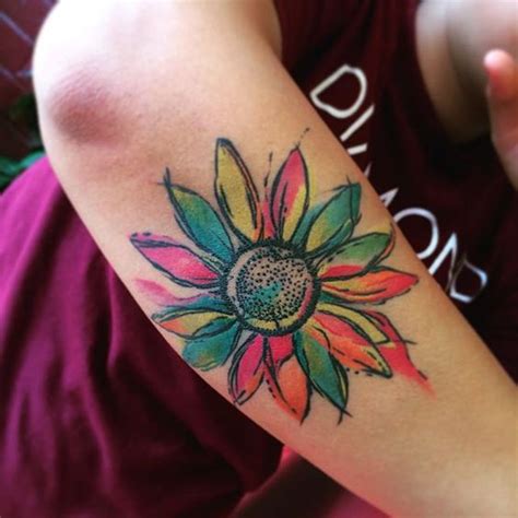 This tattoo is perfect for people who are looking for decent yet attractive daisy tattoos. 99+ Sensational Flower Tattoos - TattooMagz