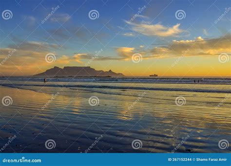 Dramatic Sky At Sunset Beach In Bloubergstrand Cape Town With Table