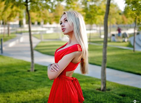 Blonde Girl Red Dress Looking Upward 4k Wallpaperhd Girls Wallpapers