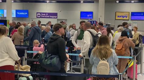 Uk Passengers Wait In Long Queues At Bristol Airport Ahead Of Summer