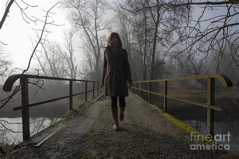 Woman Walking On A Bridge Photograph By Mats Silvan