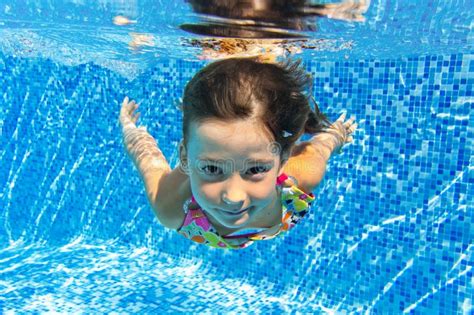 Happy Smiling Underwater Child In Swimming Pool Stock Image Image
