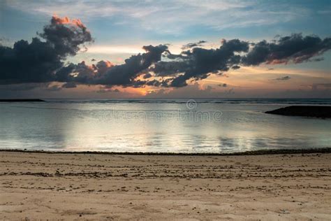 Beautiful Sunrise On A Secluded Beach On The Island Of Bali Stock Photo