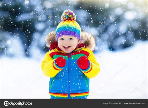 Child Playing Snow Winter Little Boy Colorful Jacket