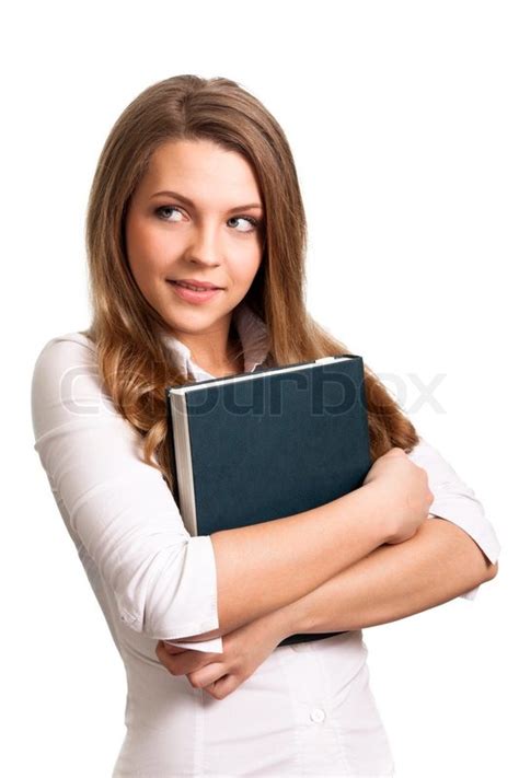 Attractive Woman Smiling While Holding Book Stock Photo Colourbox