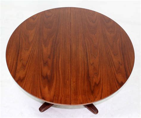 Comfortably seating four to six with its expandable sides, its perfect for family dinners and guests. Danish Mid Century Modern Round Dining Table with ...