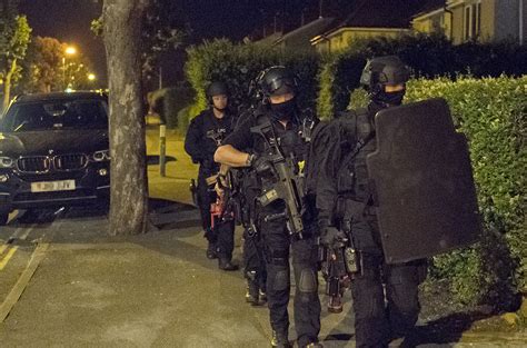Armed Police Raid House After Crime Scene Put In Place Around Car In