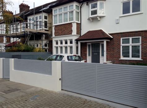 Regardless of how beautiful your house looks from the inside; Front boundary wall screen automated electronic gate ...