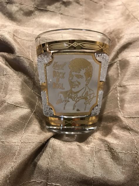 They are made of tile and glass pieces and come in a pewter tone wooden shadow box. Elvis Presley "King of Rock n Roll" Culver Shot Glass 1995 ...