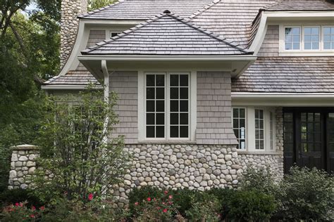 Shingle And Stone Siding Paired With A Cedar Shingle Roof