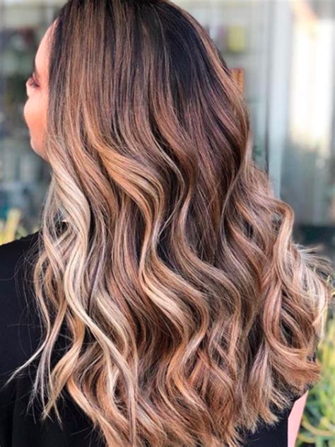 Stick with caramel hair color if you're looking for a warmer brunette shade filled with golden hues. The Caramel Latte Hair-Color Trend Looks as Delicious as It Sounds | Hair color trends, Balayage ...