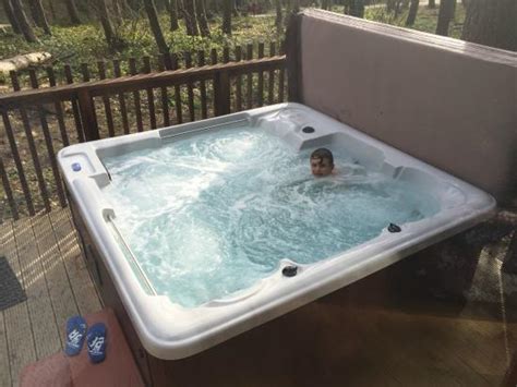 Sherwood forest cabins with hot tubs. Balcony overlooking Hot Tub (Golden Oak) - Picture of ...