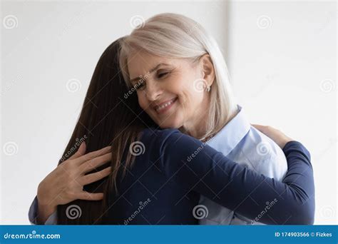Smiling Mature Mom And Adult Babe Hug Making Peace Stock Photo Image Of Next Female