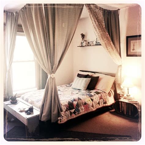 Canopy bed curtains could very easily and completely shroud the bed as an enclosure. Diy canopy bed. Rope, small hooks and cheap curtains ...