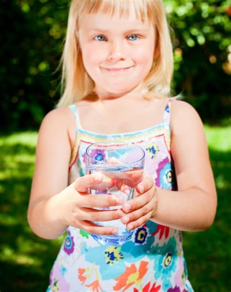 Premium Photo Child With Glass Of Water