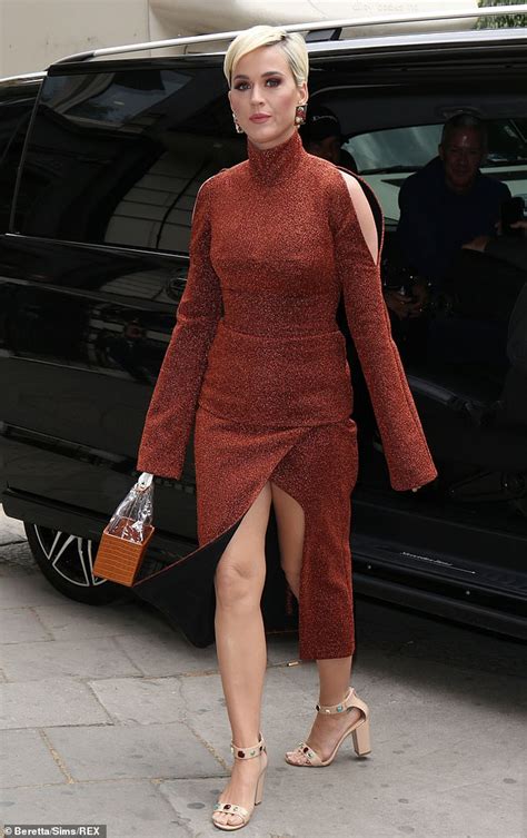 katy perry flashes some serious leg in glitzy brown outfit daily mail online