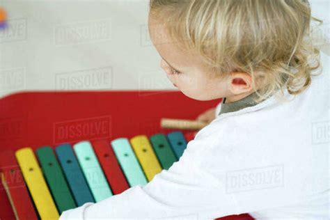 Baby Boy With Toy Xylophone High Angle View Stock Photo Dissolve