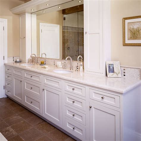 Bathroom vanities can pair practical storage space and stylish design details. Custom Cabinetry
